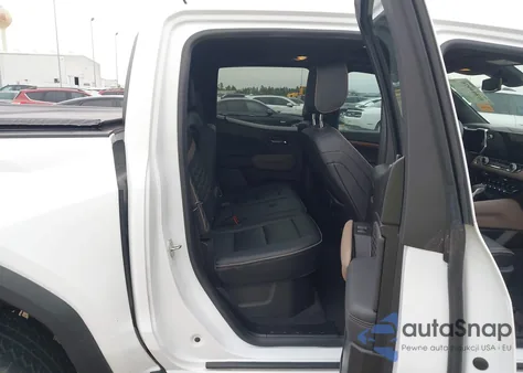 2023 GMC Canyon 4Wd Short Box Denali z USA, uszkodzony, nr VIN 1GTP6FEK1P1177770